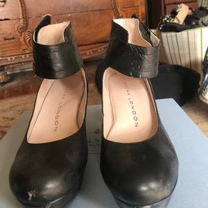 Black ankle strap pumps by Fly London